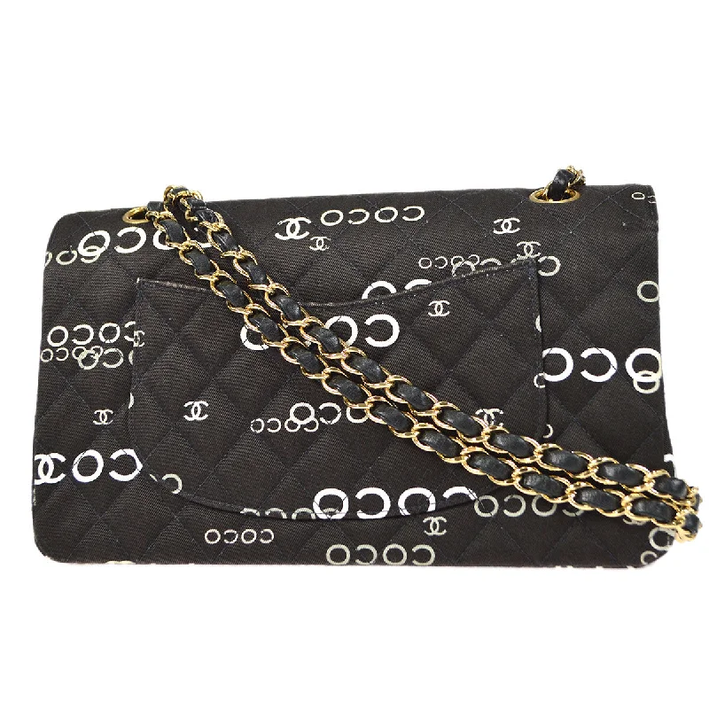 CHANEL 2001-2003 COCO patterned Classic Double Flap Medium Black Canvas